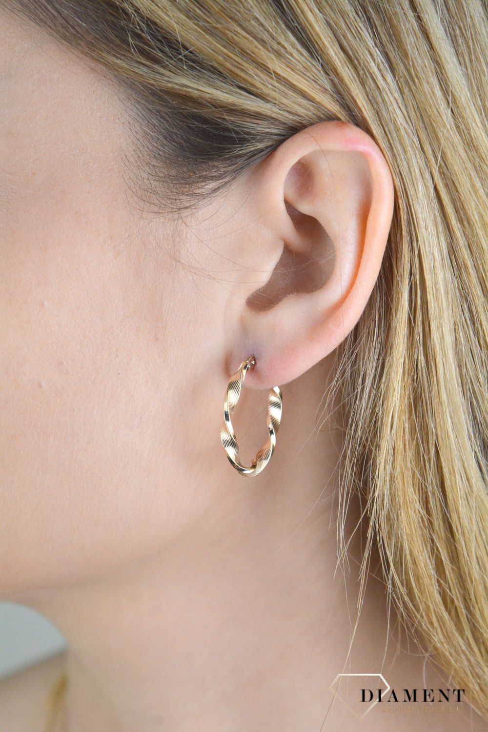 Złote kolczyki damskie 375 zakręcone owale KL 11716 375.jpg